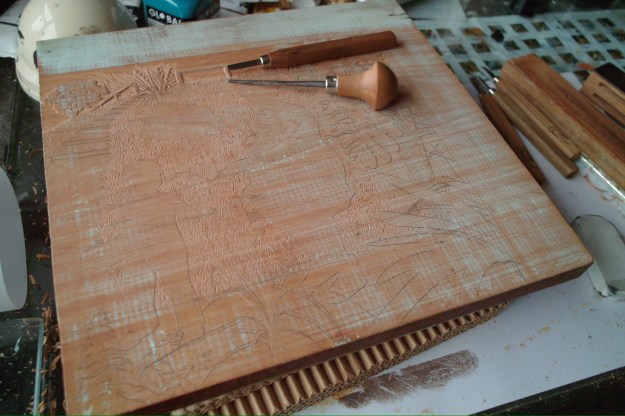 Did you notice that the picture on the wood block is the other way round from the one in the finished book? 